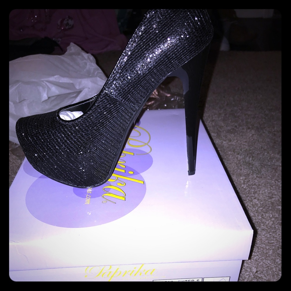Women Sparkling Black high heels.